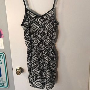 Almost new romper with a fun pattern
